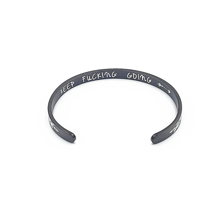 Musta Teräsrannekoru, Keep Fucking Going