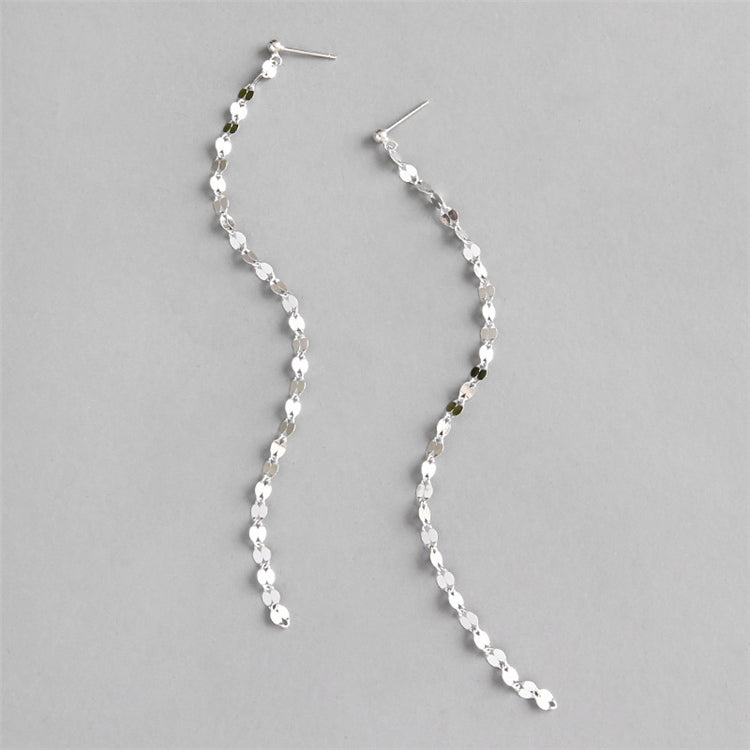 Långa silverörhängen med skiva