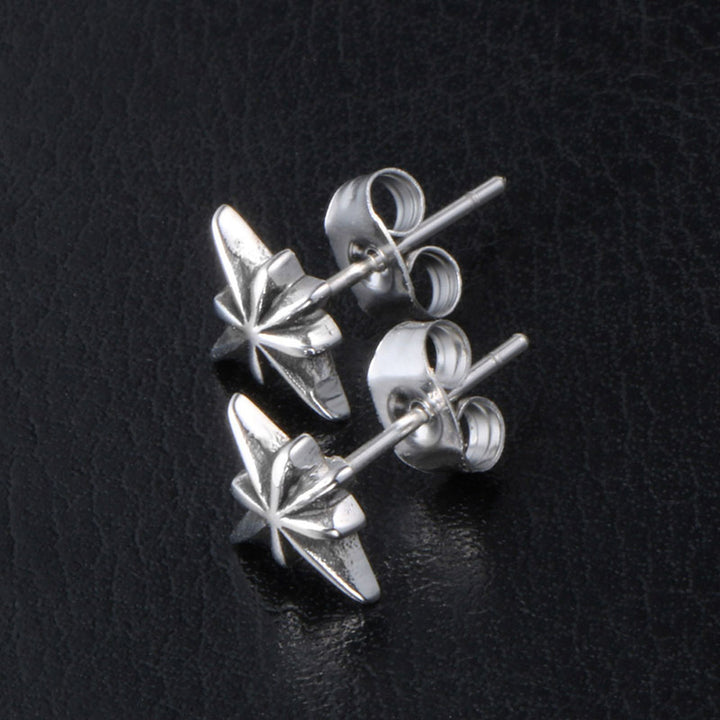 Kompassitähti Teräskorvakorut