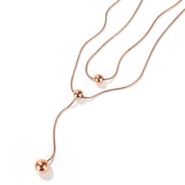 Ruusukullattu Teräskaulakoru, Kerroksellinen Pallo Design