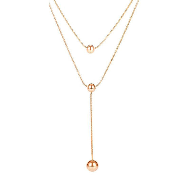 Ruusukullattu Teräskaulakoru, Kerroksellinen Pallo Design